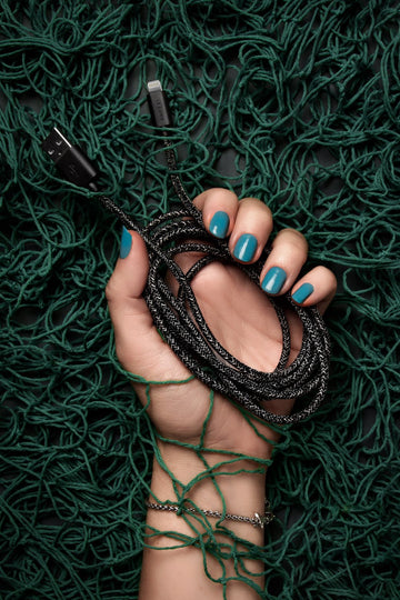Black iPhone Lightning cable · 6.5'· Made of recycled fishing nets